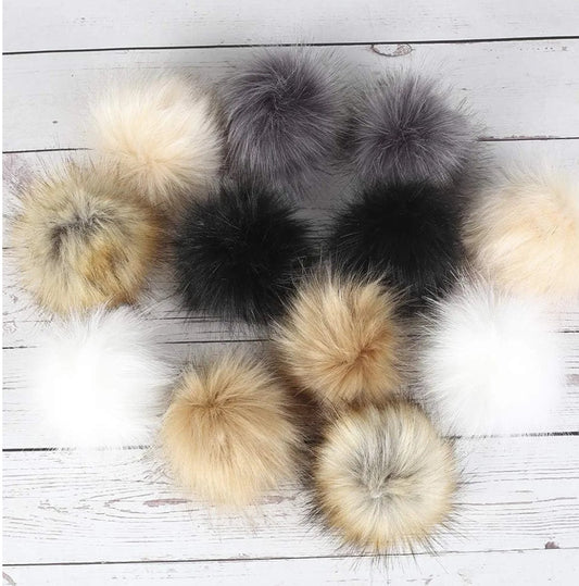 Pompon fausse fourrure de 10 cm avec élastique